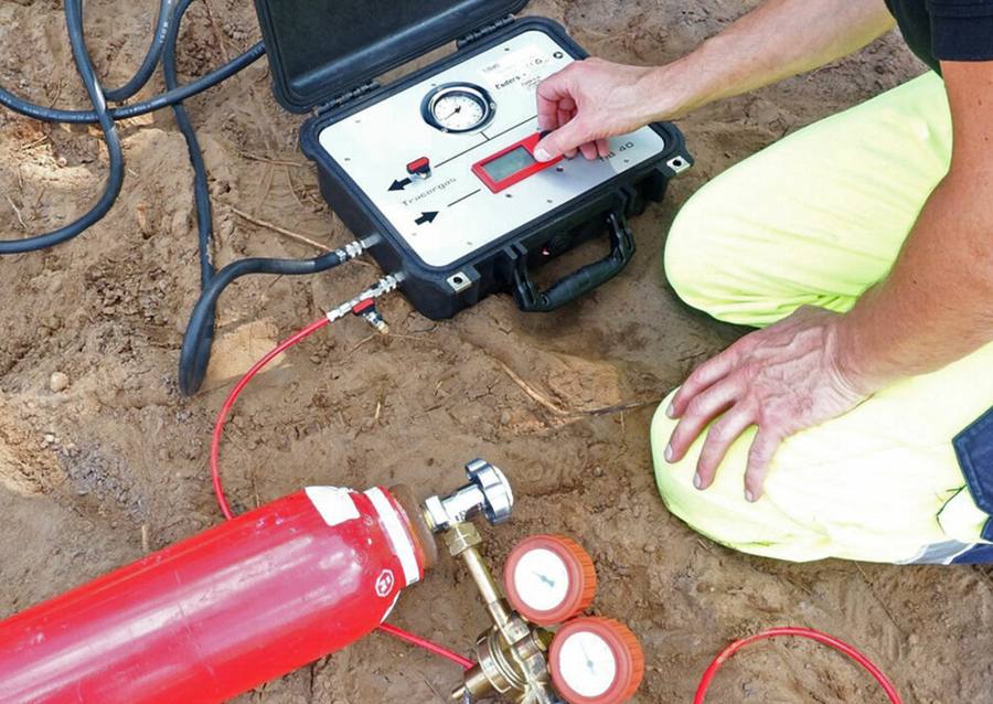 Plumber performing leak detection in a Pomona, CA home